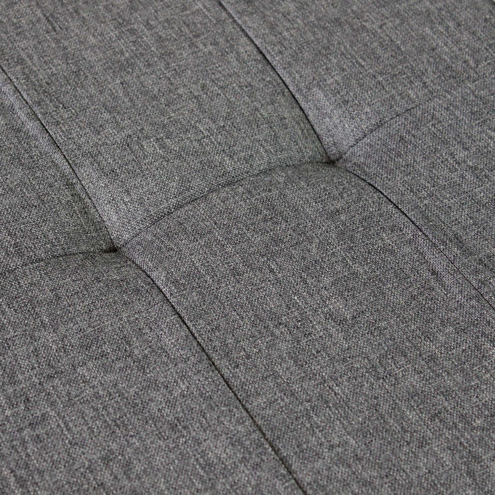 Pouf contenitore rettangolare in tessuto grigio scuro con dimensioni 76x38xH38 cm