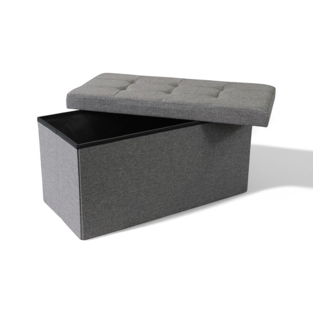 Pouf contenitore rettangolare in tessuto grigio scuro con dimensioni 76x38xH38 cm