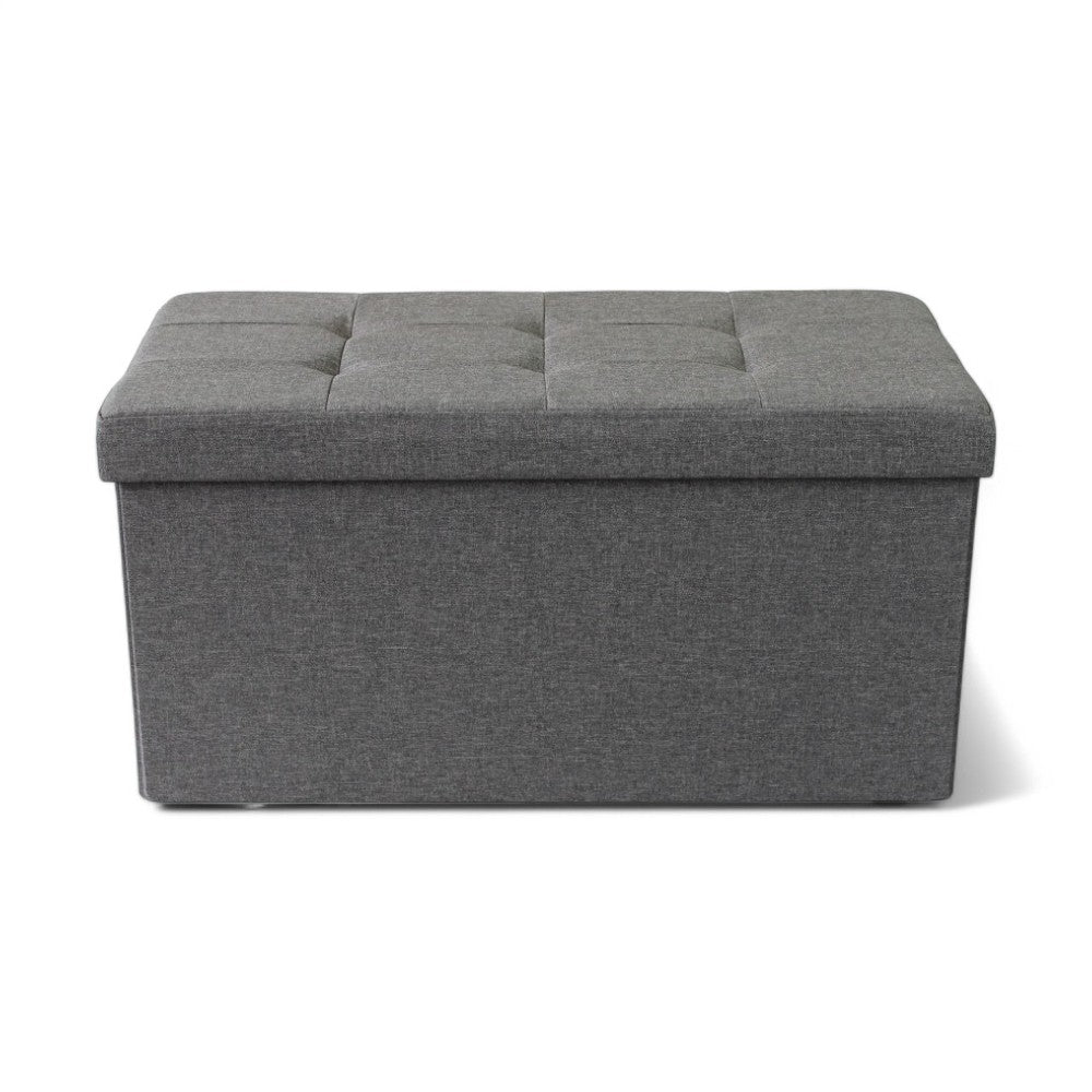 Pouf contenitore rettangolare in tessuto grigio scuro con dimensioni 76x38xH38 cm