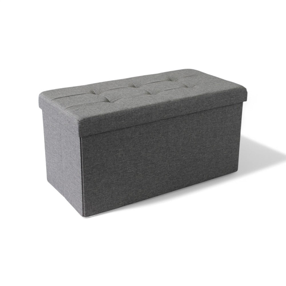 Pouf contenitore rettangolare in tessuto grigio scuro con dimensioni 76x38xH38 cm